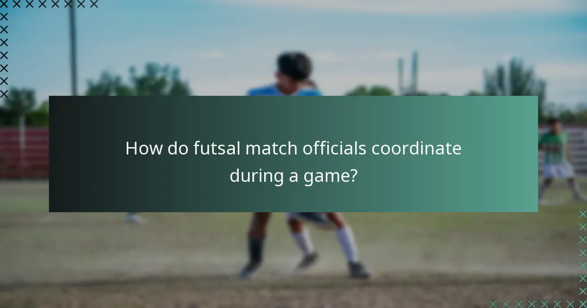 How do futsal match officials coordinate during a game?
