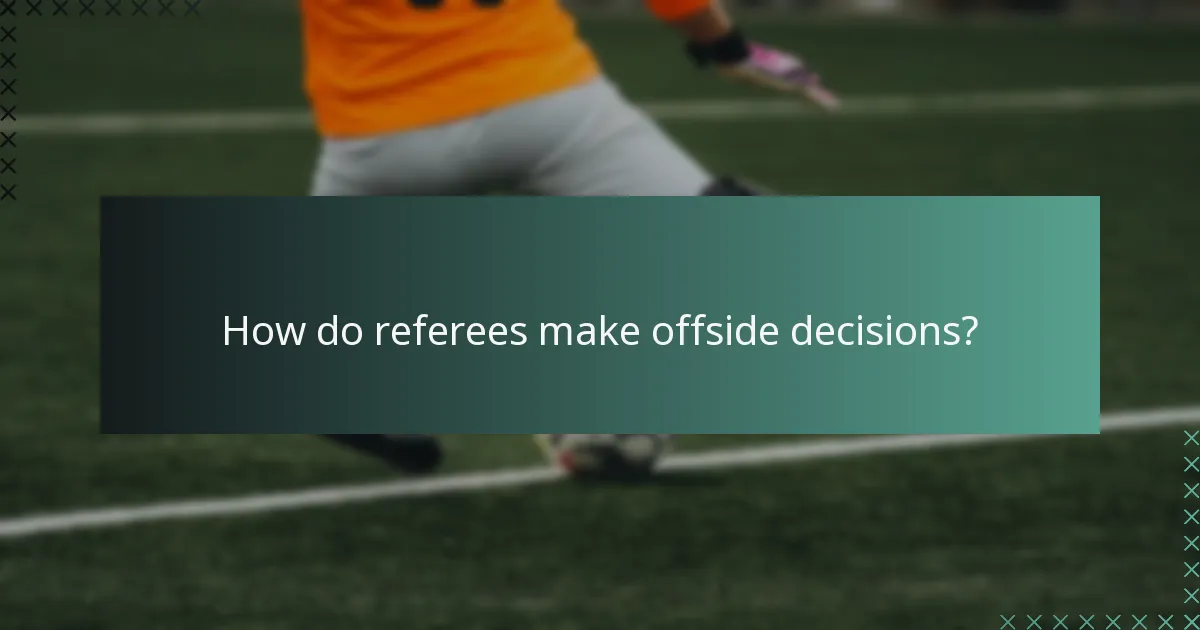 How do referees make offside decisions?